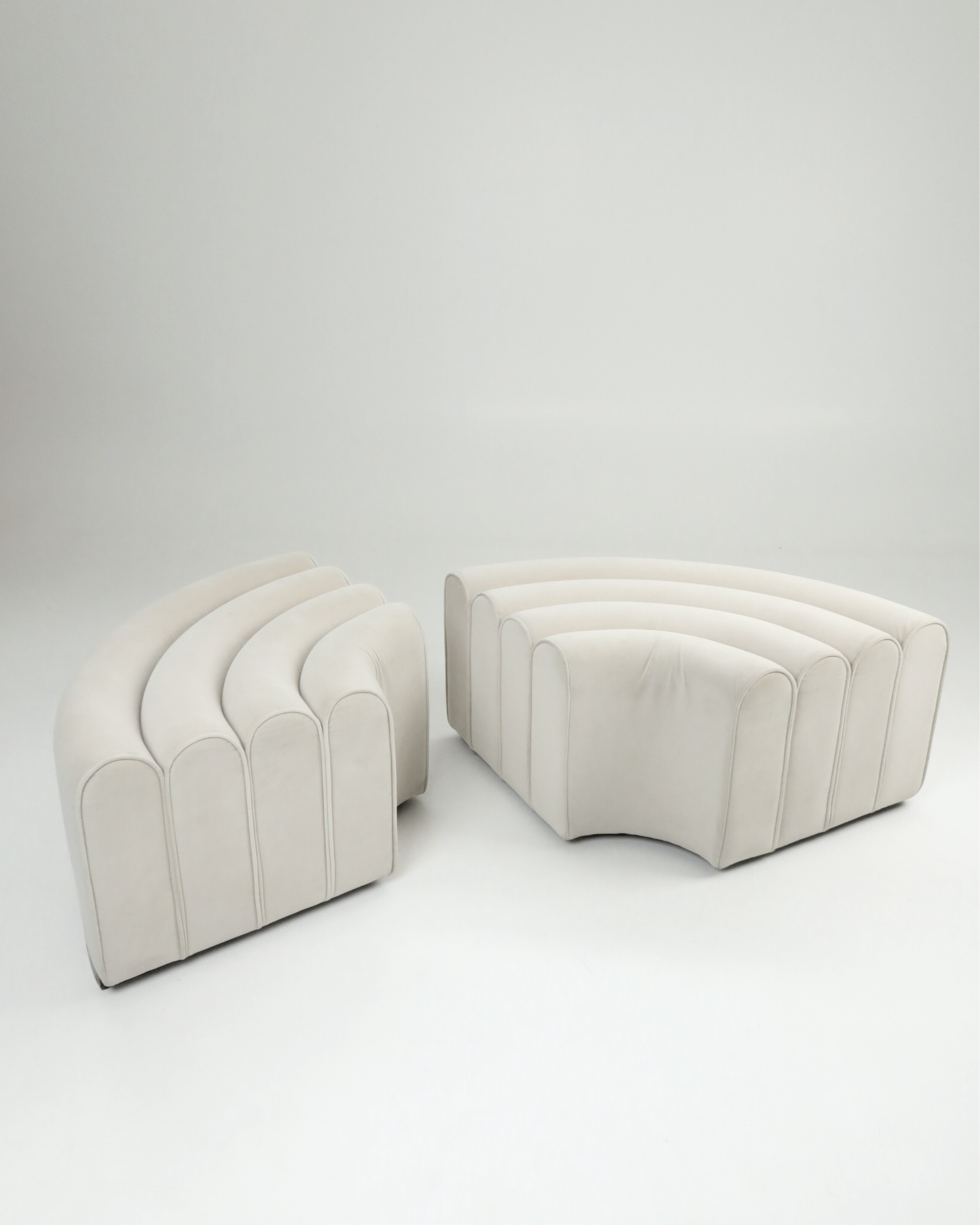 Curved Vanilla Ottomans