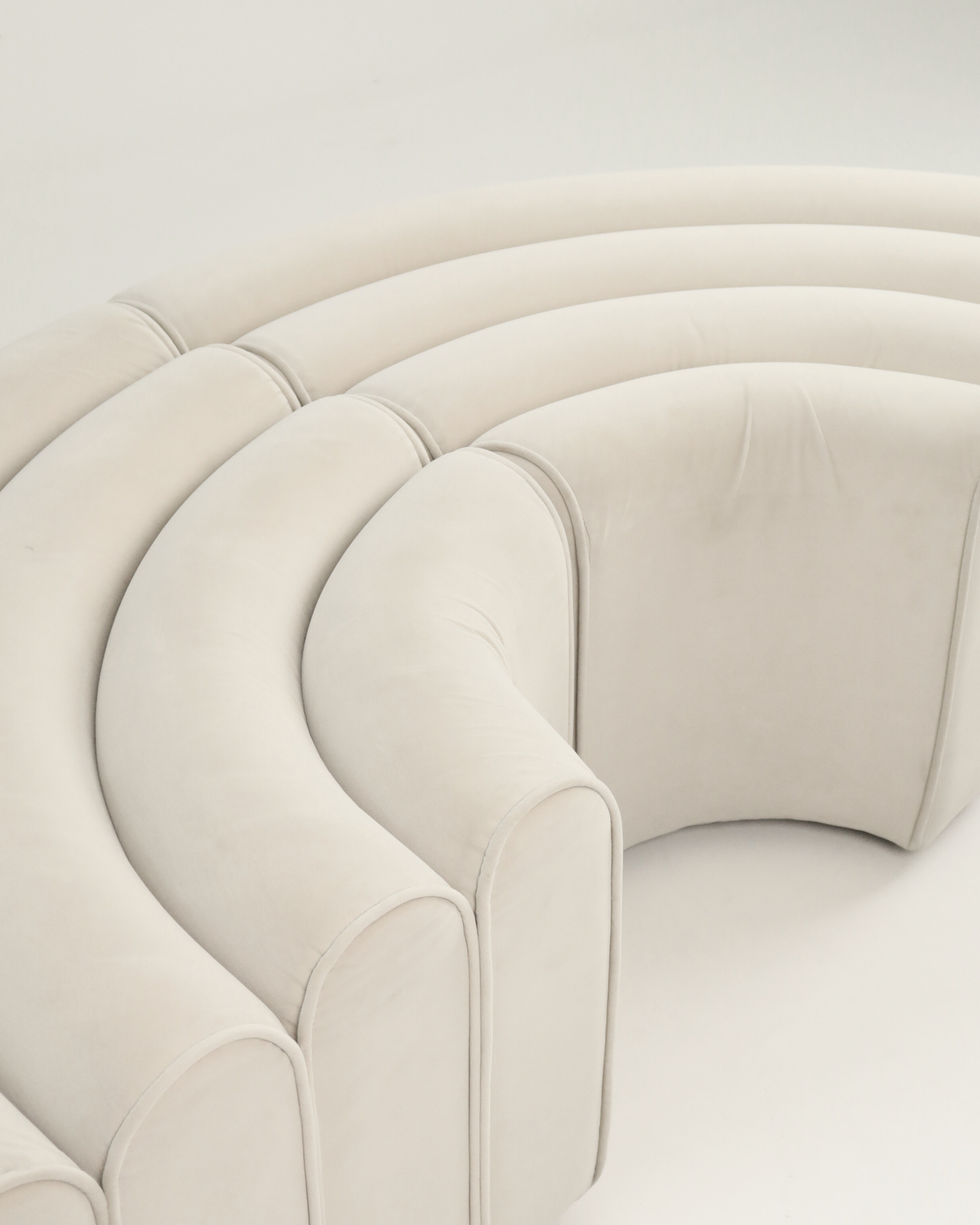 Curved Vanilla Ottomans