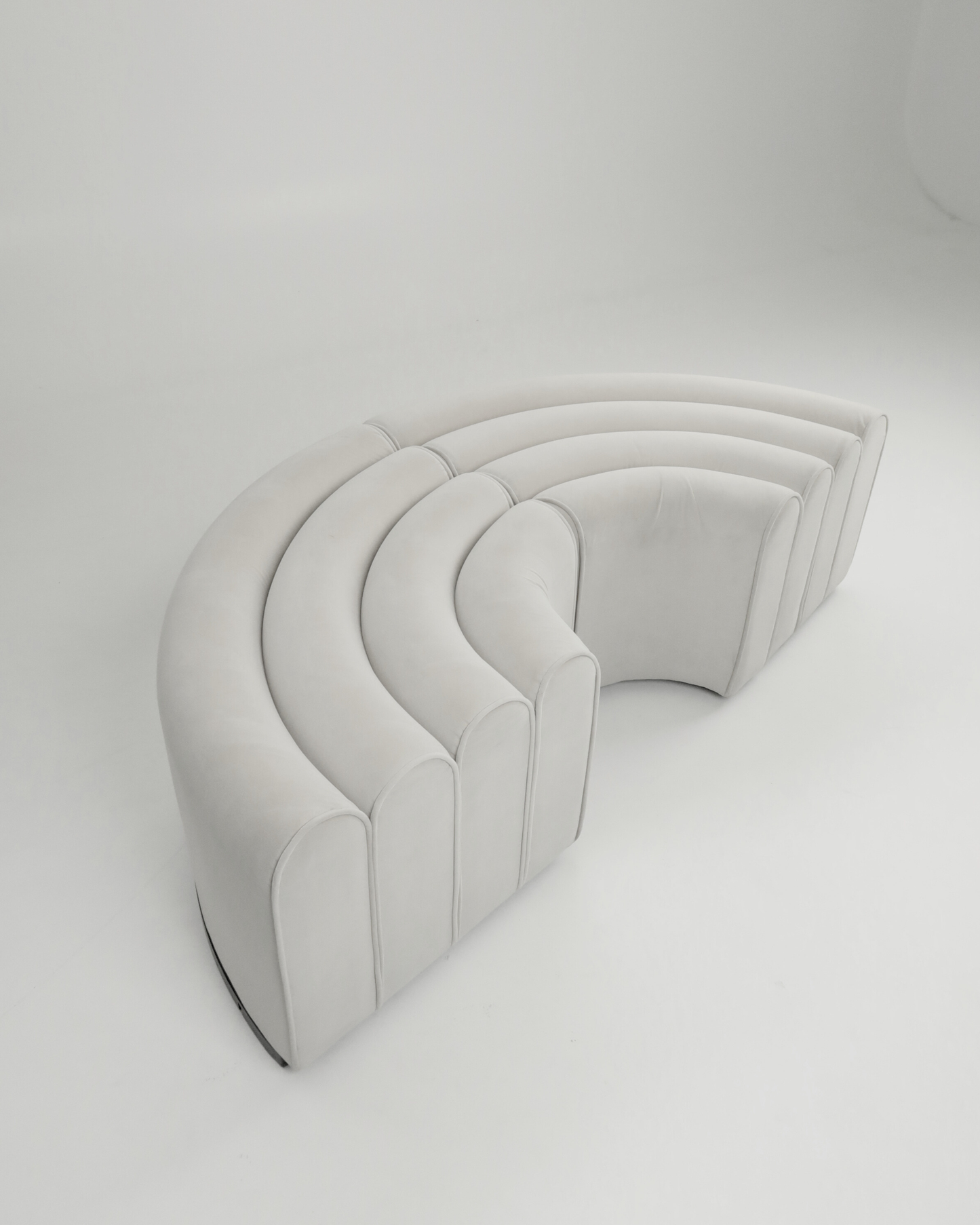 Curved Vanilla Ottomans